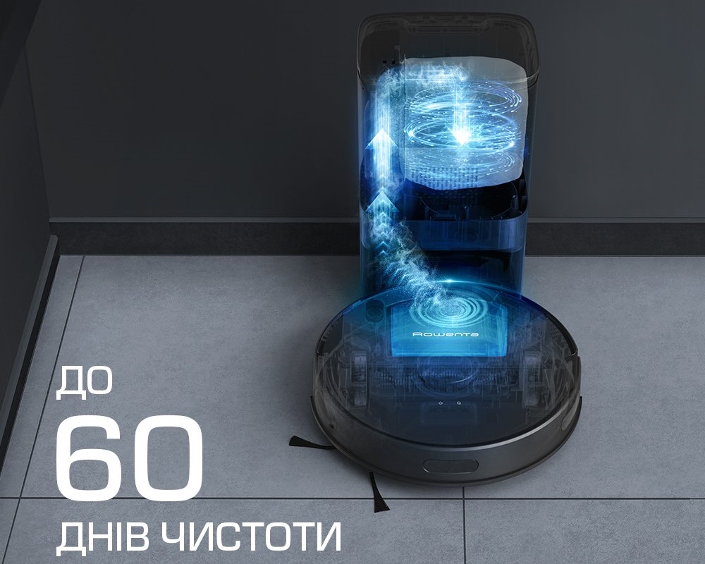 Робот-пилосос Rowenta на док-станції для зарядки в сучасному інтер’єрі